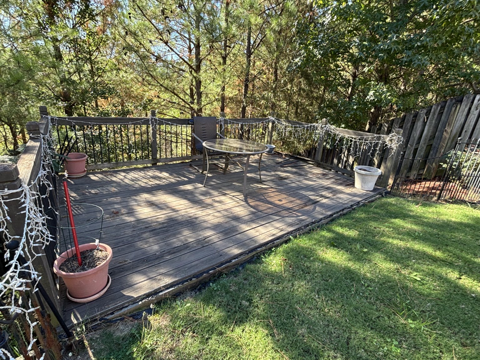 Weathered wood deck before renovation