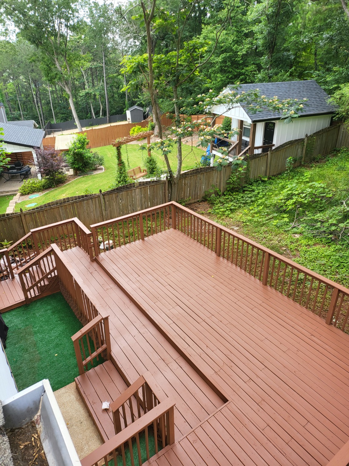 Finished reddish-brown deck viewed from above
